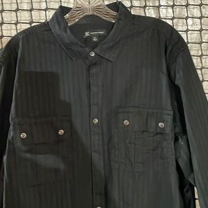 Men’s casual dress shirt that has a cool texture strip design. Black/ blue color